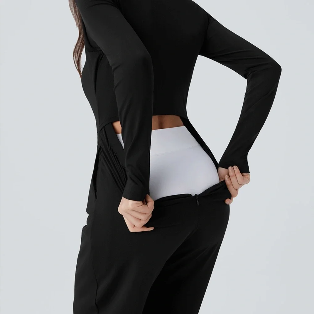 Halara Black SculptKnit V Neck Sleeveless Ruched
Pocket Jumpsuit, Easy Peezy - Picture 7 of 10